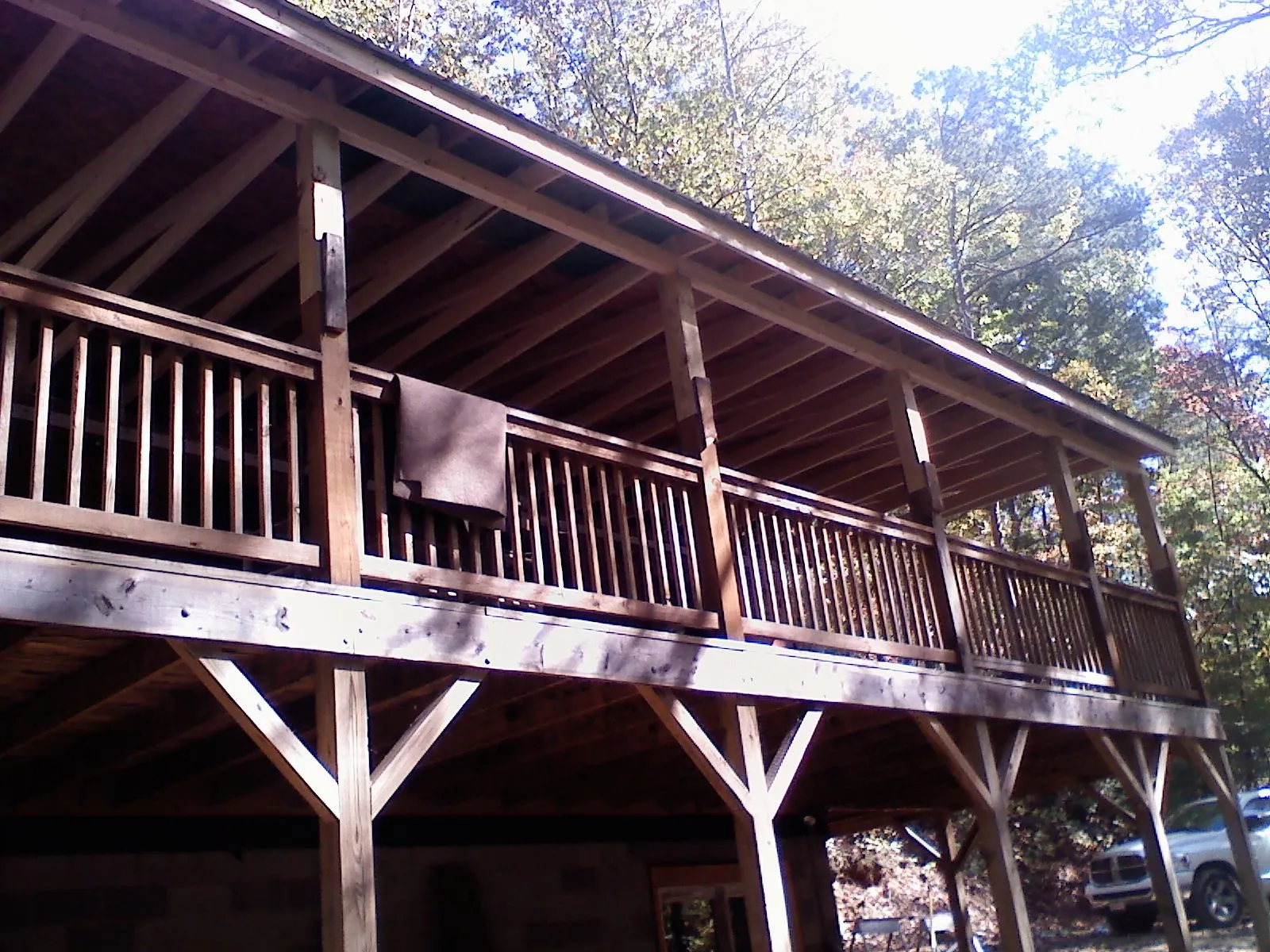 Timber framing under a new elevated porch and deck — Roof Leak Repair in Oak Creek by Roofing Brothers